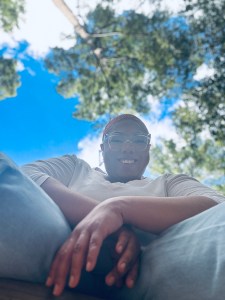 Being embraced by the first day of fall, 2023. Andonnia backed by the blue skies and green trees. 